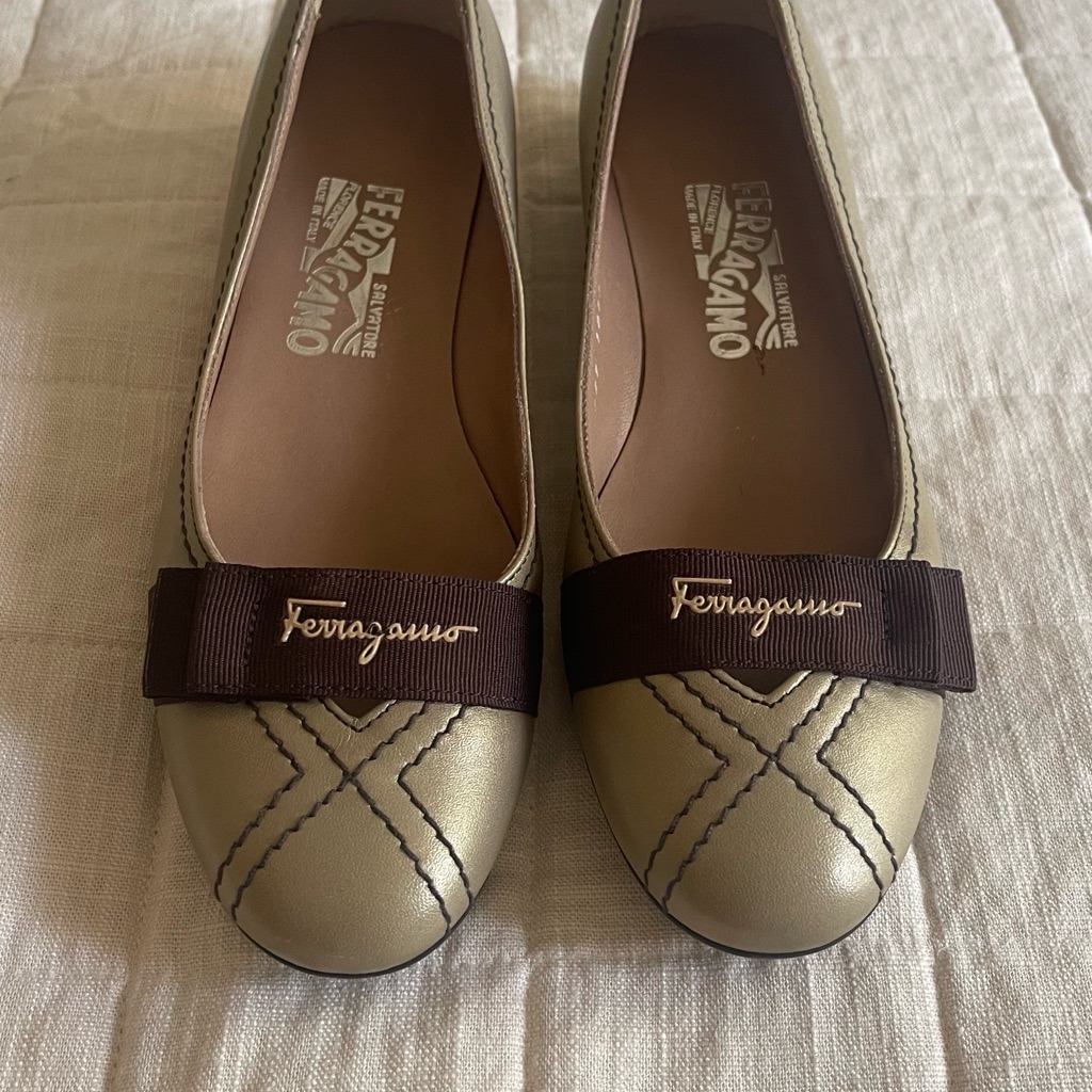 Salvatore Ferragamo Gold Flats Timeless Elegance